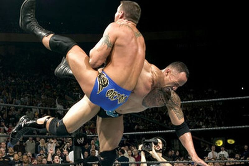 The Rock and Orton in action