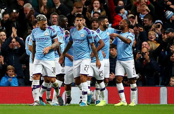 Manchester City players celebrate a goal