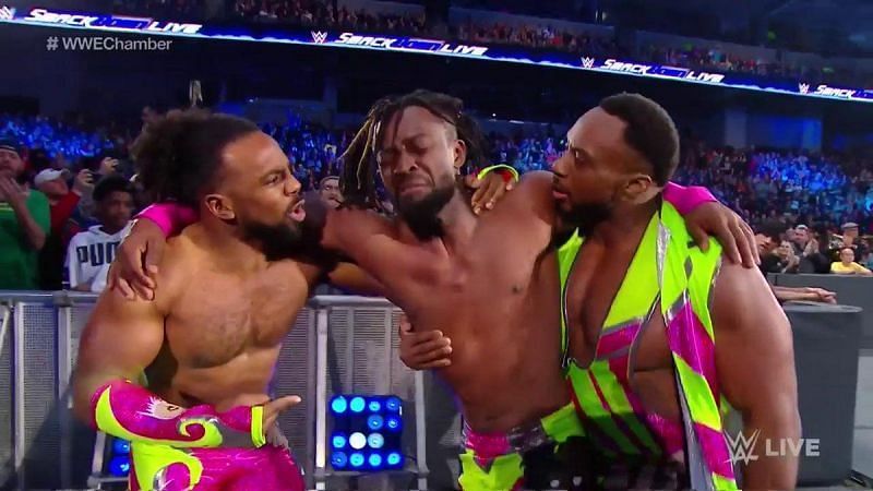 Kofi Kingston getting supported by Xavier Woods and Big E after his famous Gauntlet Match on SmackDown Live