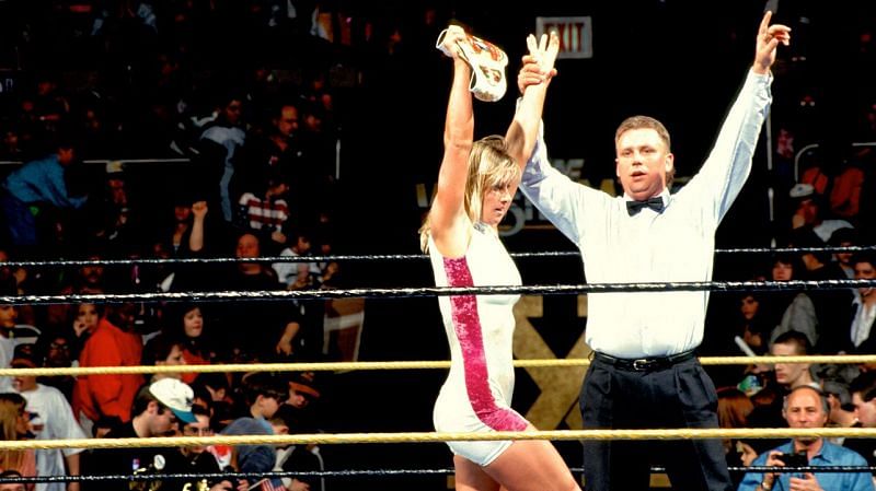 Alundra Blayze hoisting the same championship she later trashed on WCW Nitro