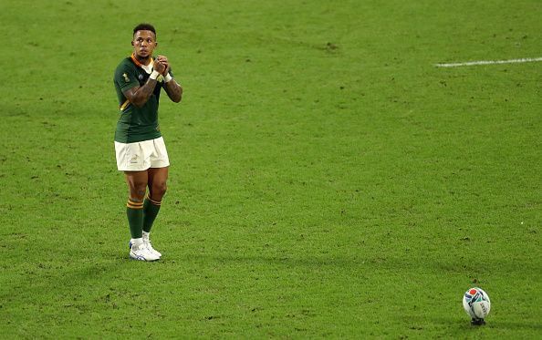 Jantjies lines up a kick versus Canada