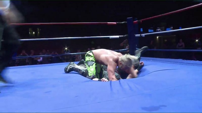 A diving crossbody by PJ Black sent RVD crashing through the ring!