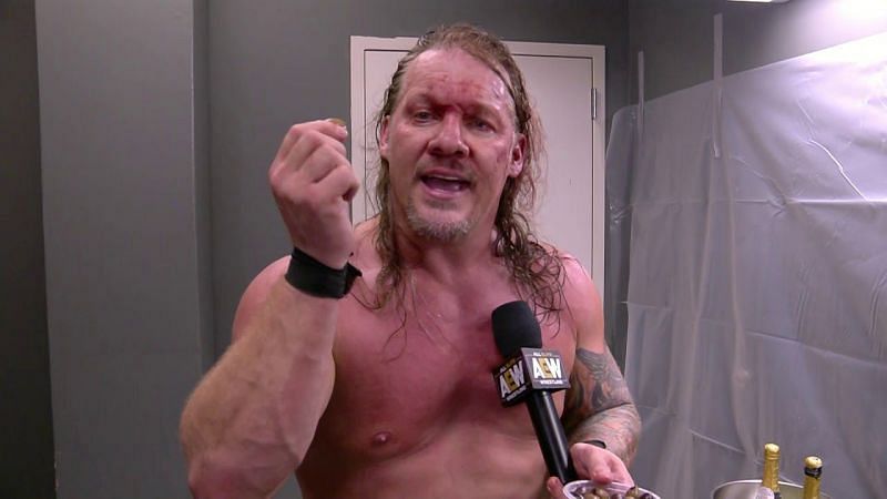 AEW World Champion Chris Jericho celebrating with a little bit of the bubbly