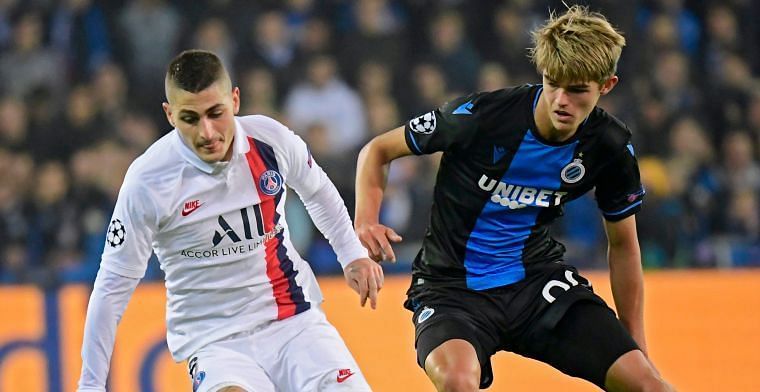 Ketelaere battling with PSG&#039;s Marco Verratti on a memorable night for the 18-year-old
