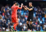 Wolverhampton Wanderers' Rui Patricio (L) and Conor Coady (R)