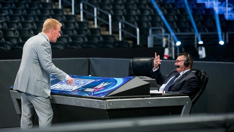 Michael Cole and Jeff Jarrett!