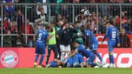Hoffenheim players celebrate their second goal during a memorable win