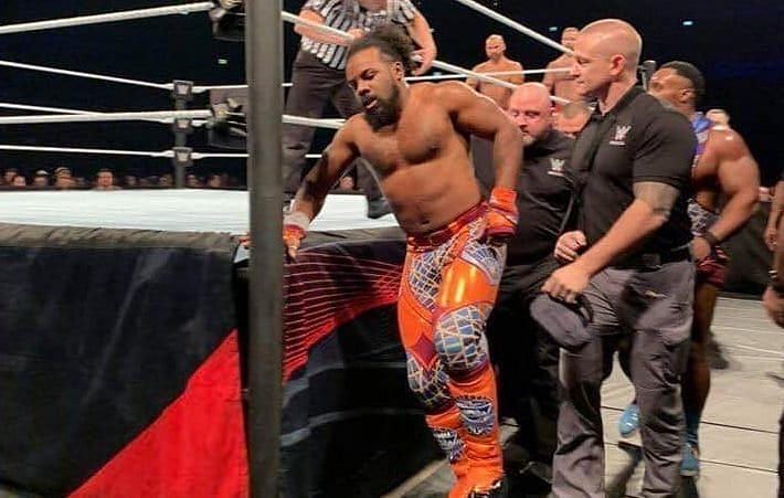 Xavier Woods being taken off the stage