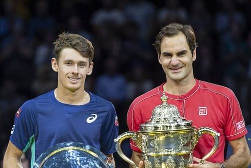 A triumphant Federer with the trophy at Basel.