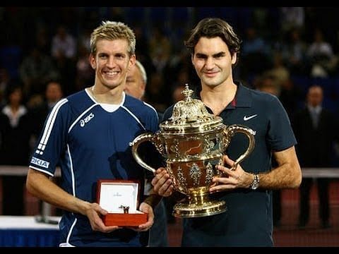 Federer poses with his second Basel title in 2007
