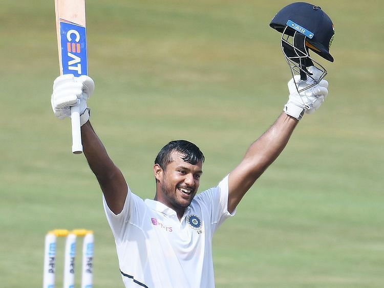 Mayank Agarwal soaks in the applause after reaching three figures.
