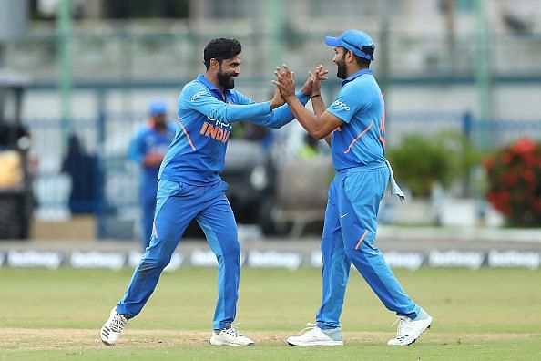 Ravindra Jadeja (left).