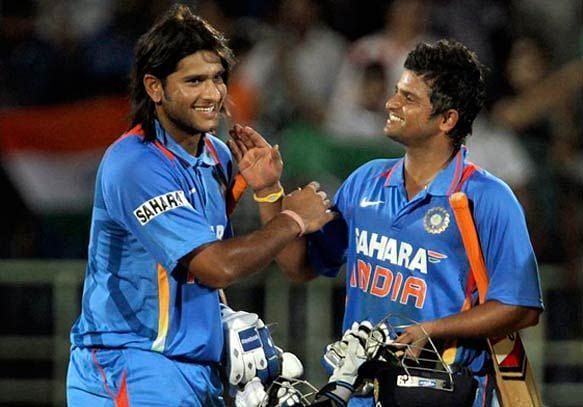 Saurabh Tiwary with Suresh Raina