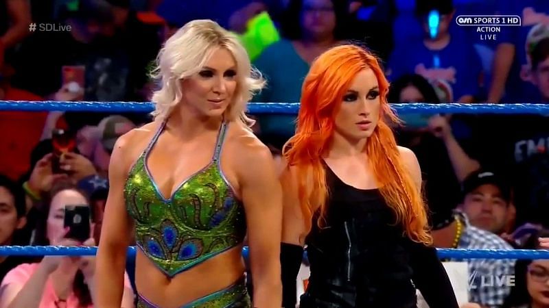 Charlotte Flair and Becky Lynch have a score to settle with the champs