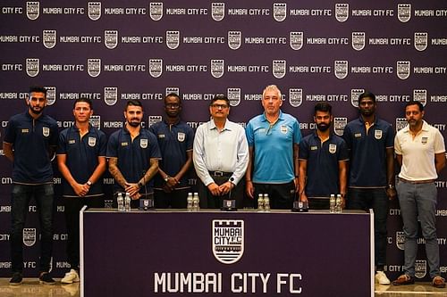 L-R: Pratik Chaudhari, Amine Chermiti, Paulo Machado, Modou Sougou, Bimal Parekh (Co-Owner), Jorge Costa (Head Coach), Mohammed Rafique, Rowllin Borges, Indranil Das Blah (CEO).