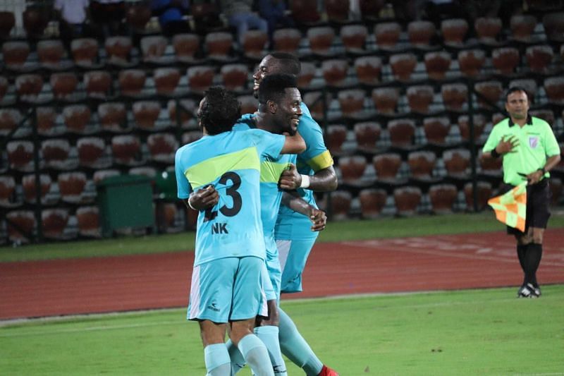 Asamoah Gyan celebrates after scoring his forst goal for the Highlanders.