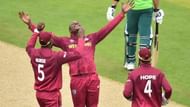 Sheldon Cottrell celebrating a wicket.