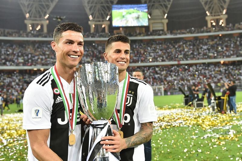 Juventus star Cristiano Ronaldo celebrate with the Supercoppa trophy. in Jeddah