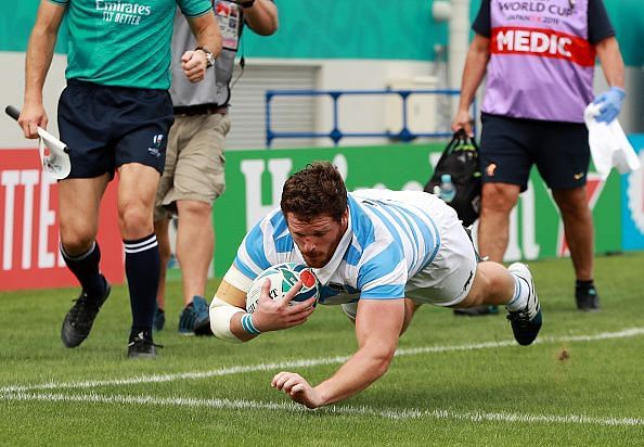 Montoya dives for his first of three tries against Tonga.