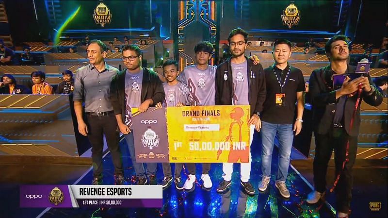 Revenge Esports holding their prize