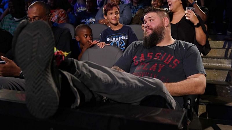 Kevin Owens sits with the fans