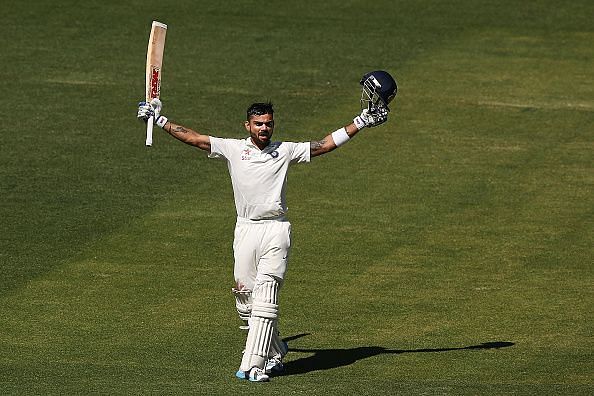 Virat Kohli celebrates a hundred