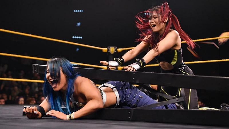 Io Shirai and Mia Yim battle it out for a WarGames advantage