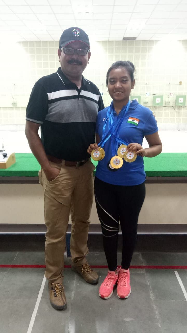 Ayushi Podder with coach father