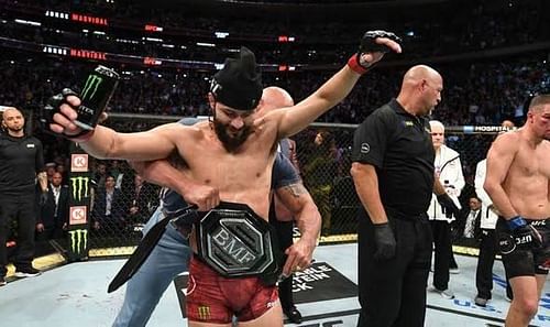 'The Rock' puts the BMF belt around Jorge Masvidal