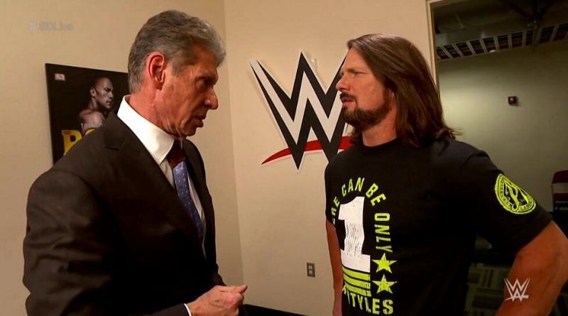 AJ Styles and Vince McMahon.