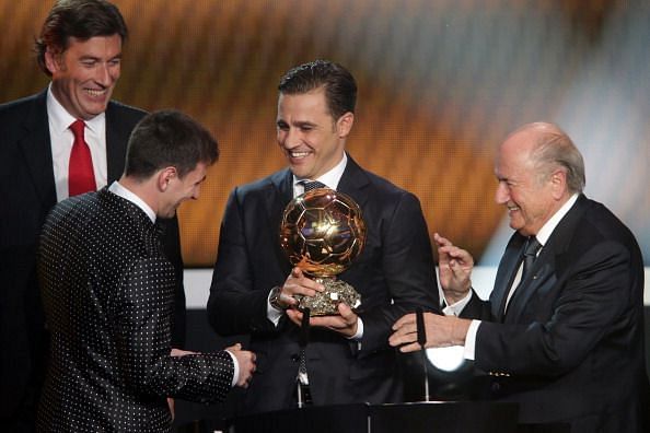 FIFA Ballon d&#039;Or Gala 2012 - former winner Fabio Cannavaro hands over the trophy to Lionel Messi