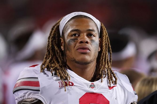 No. 3 Ohio State sits star DE Chase Young, who blames loan