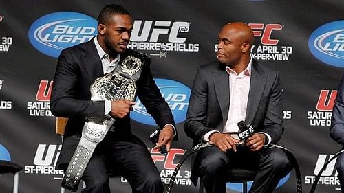 Jon Jones (left) with Anderson Silva (right)