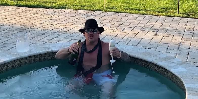 Chris Jericho enjoying a little bit of the bubbly