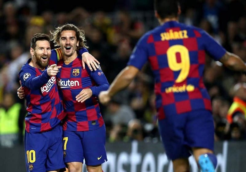 Messi, Griezmann and Suarez celebrate during Barcelona&#039;s 3-1 win over Borussia Dortmund