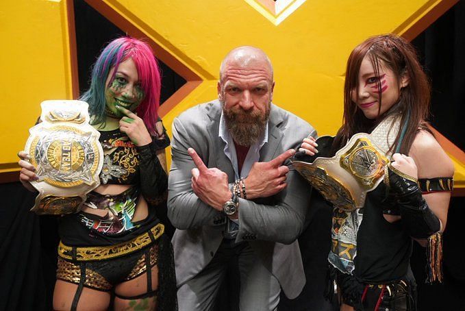 Asuka and Kairi Sane with Triple H