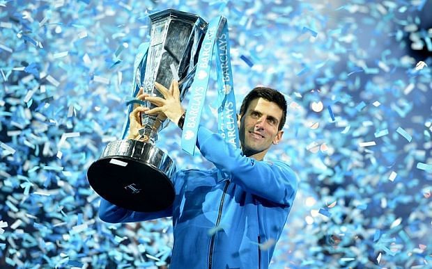 Novak Djokovic celebrates his 2015 ATP Finals title