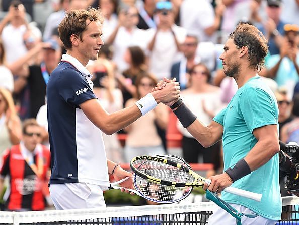 Daniil Medvedev (L) and Rafael Nadal