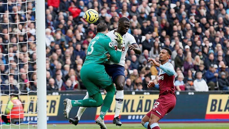 West Ham United&#039;s goalkeeper Roberto clashing with Tottenham Hotspur&#039;s Davinson Sanchez
