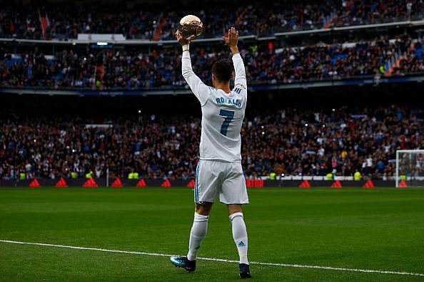 Ronaldo displaying his Ballon d&#039;Or to the Bernabeu in 2018