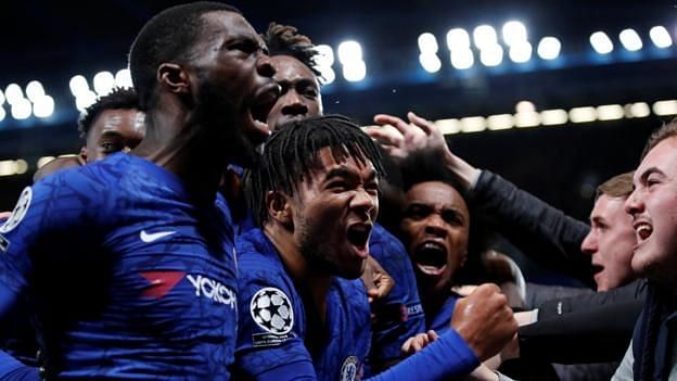 Chelsea players exult after overcoming a 1-4 deficit to snatch a 4-4 draw against nine-man Ajax.
