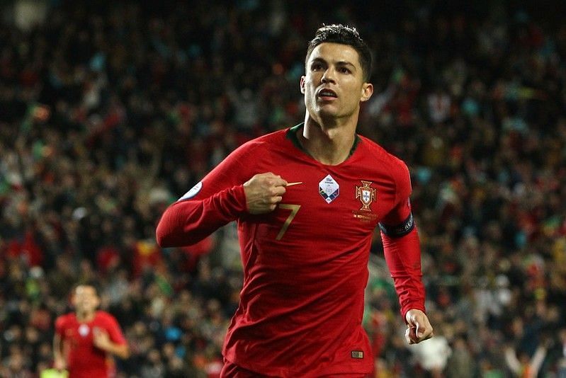 Ronaldo exults after scoring against Lithuania