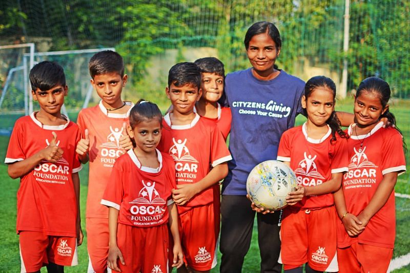 Poonam Gautam with children from OSCAR Foundation.