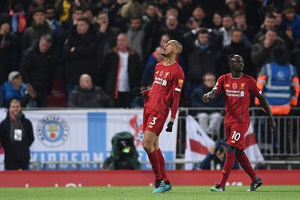 The Reds celebrate Fabinho&#039;s goal early on in the encounter