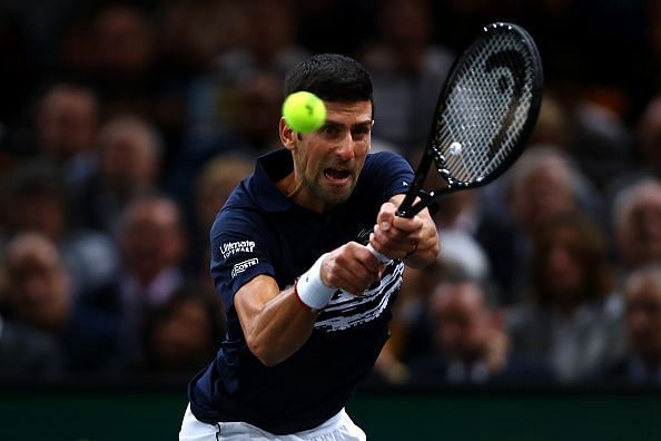 Novak Djokovic clinches a fifth title at the Paris Masters without dropping a set.