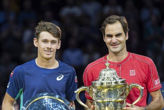 Roger Federer (R) with his 10th Basel title