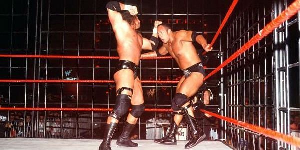 Triple H and The Rock waged war inside a steel cage