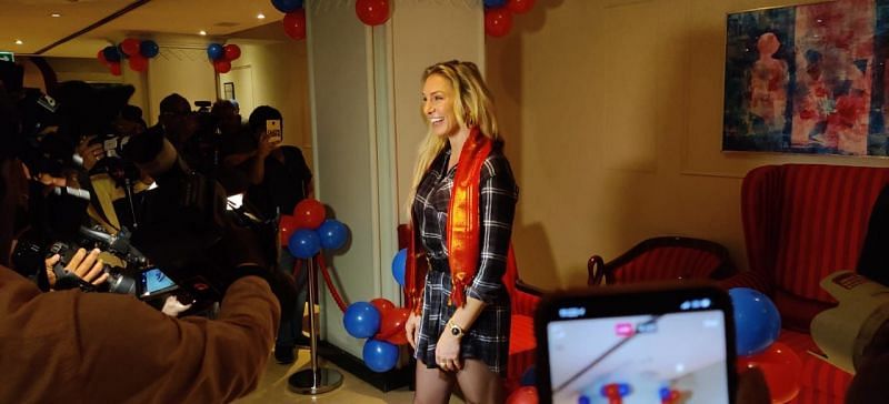 Charlotte Flair addresses the media during her trip to Mumbai