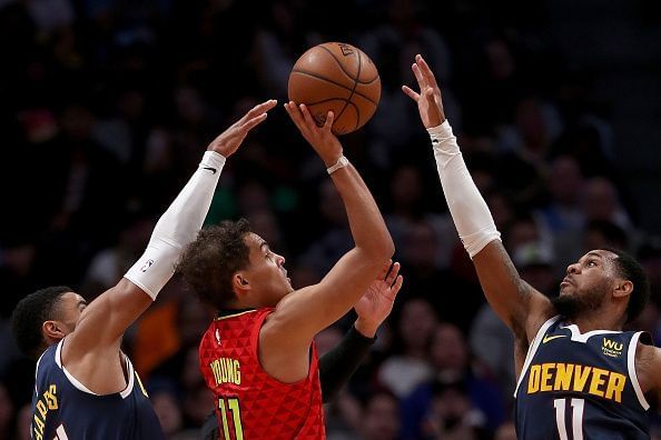 Atlanta Hawks&#039; Trae Young (center).