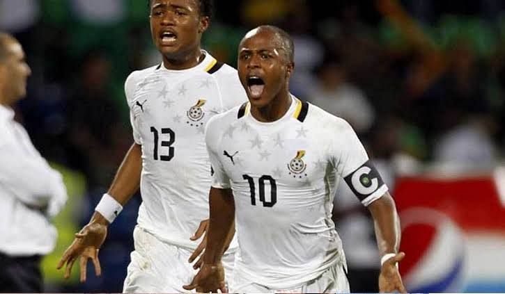 The Ayew brothers celebrating a goal for Ghana